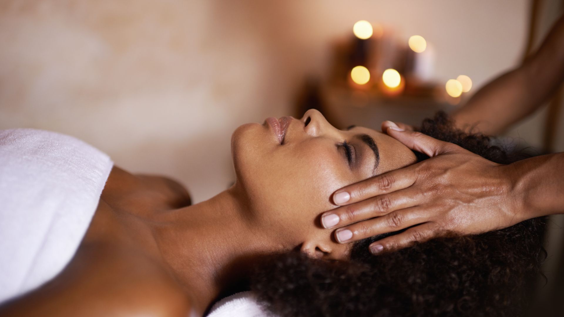Woman receiving head massage 