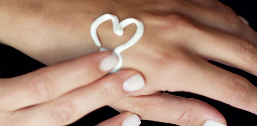 Heartshaped lotion on hand 