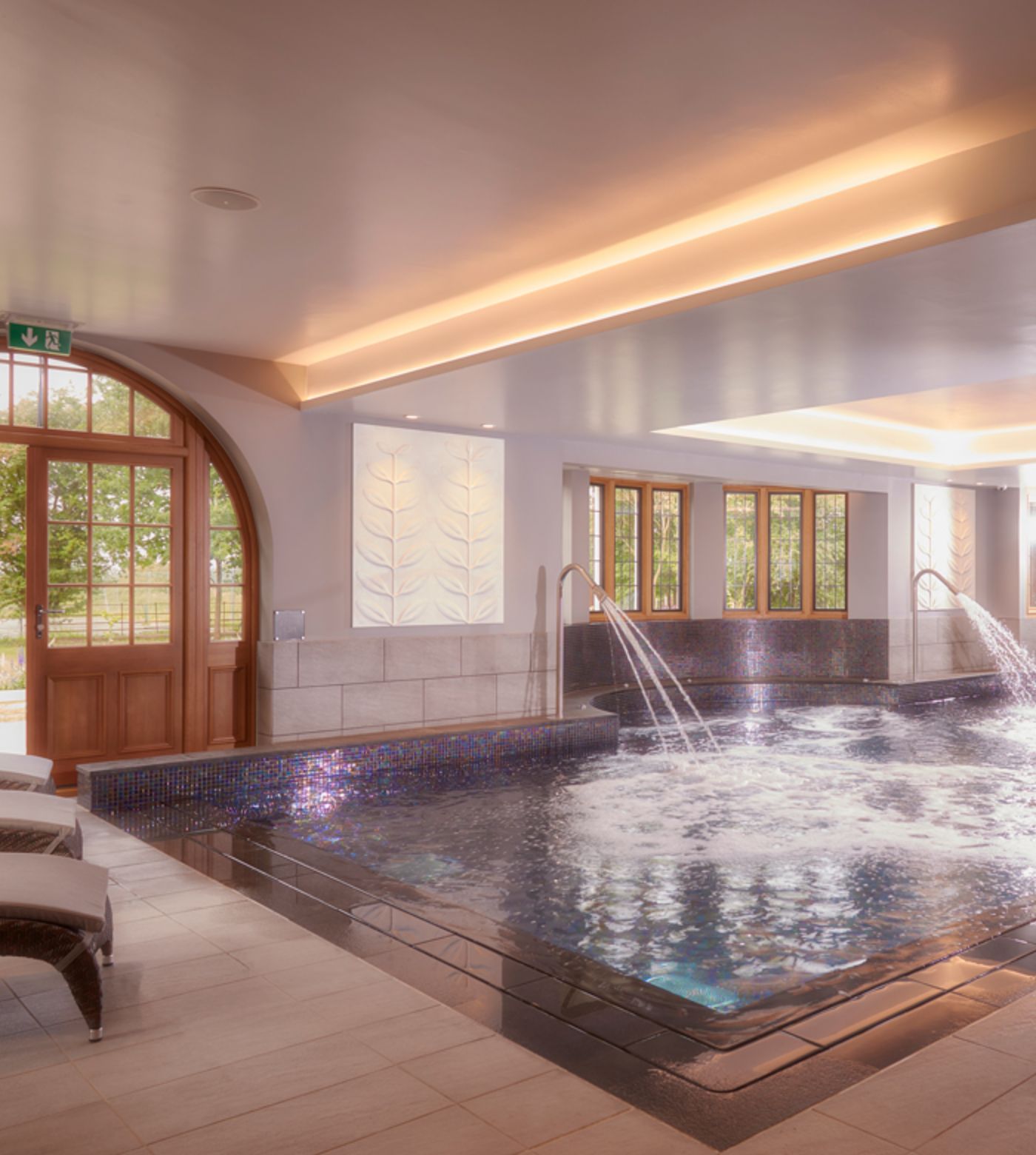 Bovey Castle Spa - man relaxing in pool with bubbles 